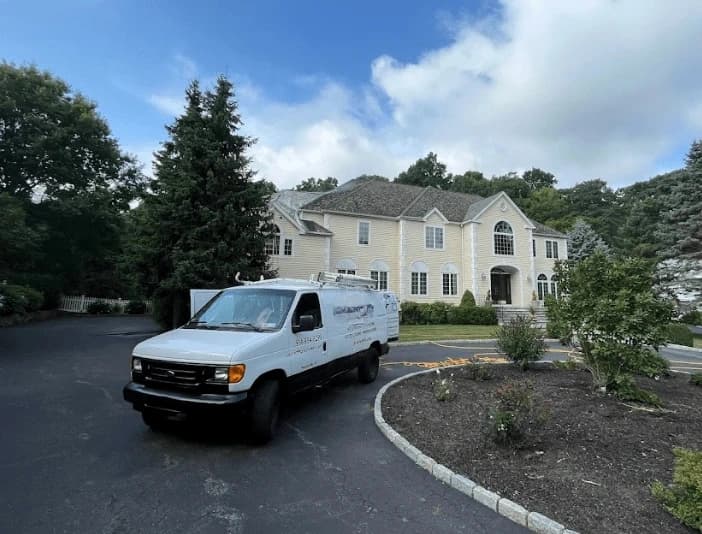 Brook Park Power Washing technician performing thorough gutter cleaning service in Brook Park